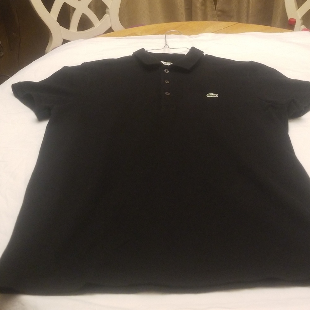 I'm selling a classic size 5 black lacoste polo